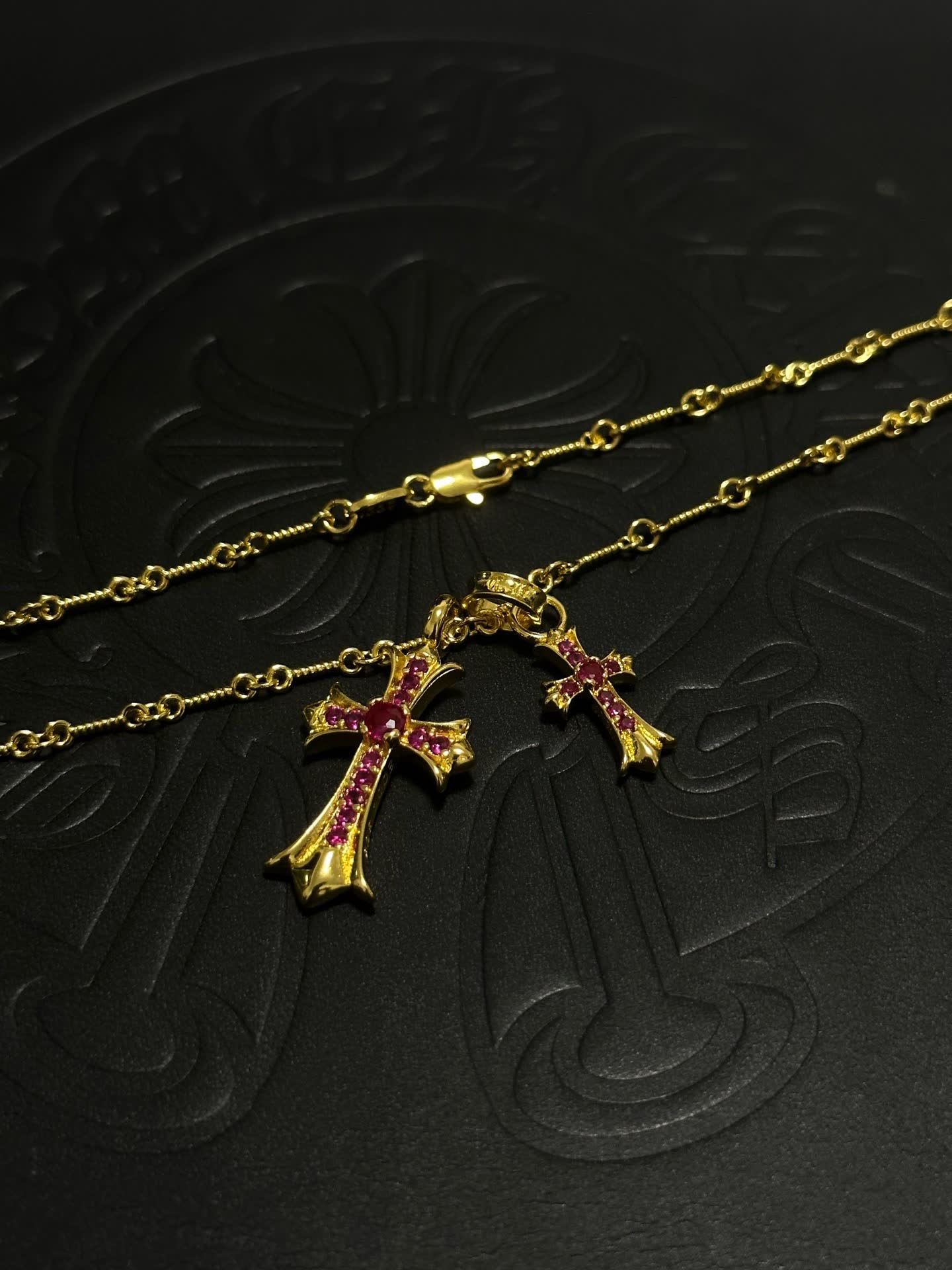 Chrome Hearts Gold Cross Pendant with Ruby Stones